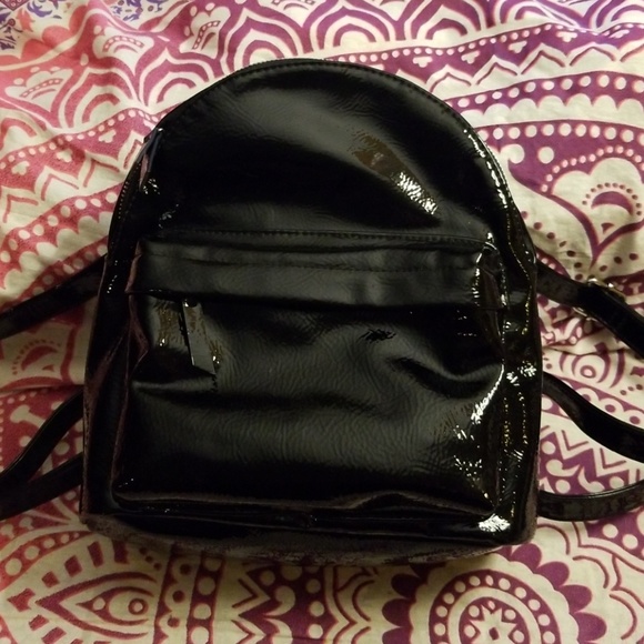 black vinyl backpack